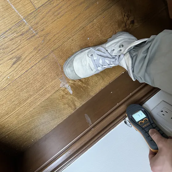 Moisture check on a hardwood floor, Central LA