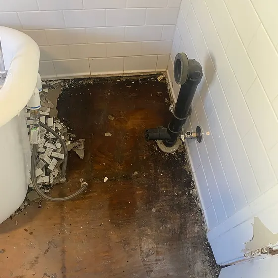 Water damage under a bathroom floor, Central LA