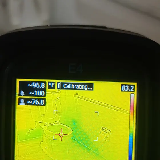 Thermal camera checking for hidden moisture, Central LA