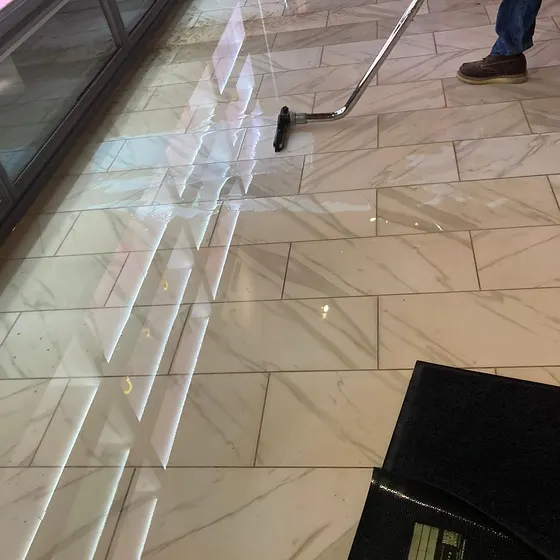 Extracting water from a tile floor, Central LA