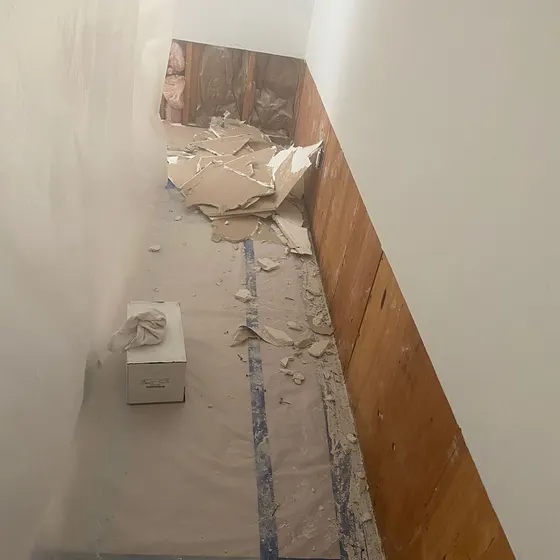 Flooring removed inside a sealed hallway, Central LA