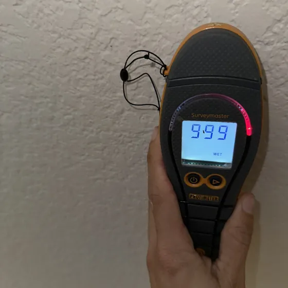 Moisture check next to a ceiling opening, Central LA