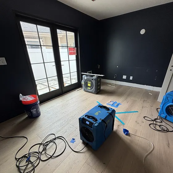 Air scrubber and air movers drying a room, Branch not recorded