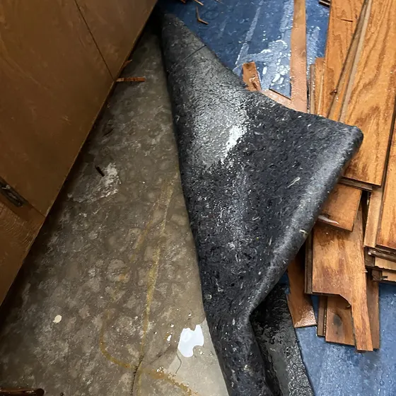 Wet flooring pulled up for drying, San Bernardino Valley