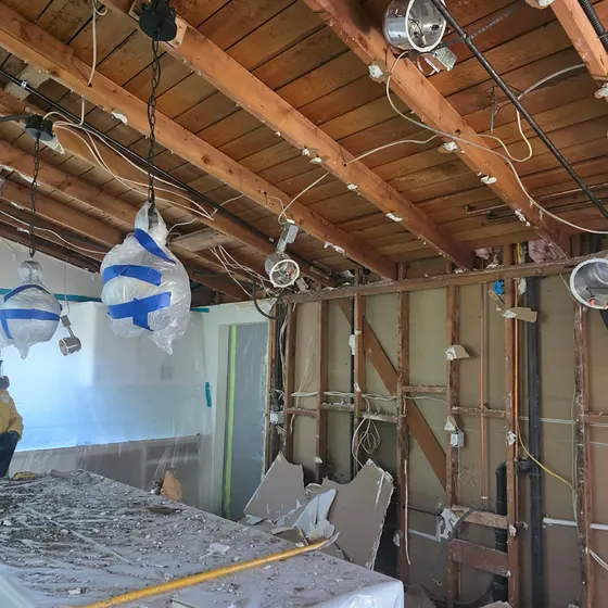 Fire-damaged kitchen stripped to the framing, Branch not recorded