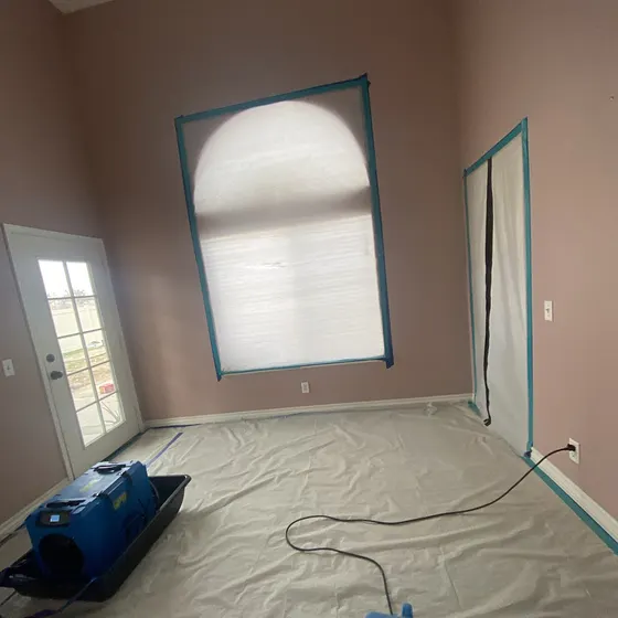 Air movers drying a living room, Antelope Valley