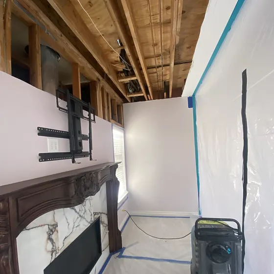 Containment around a fireplace wall, Antelope Valley