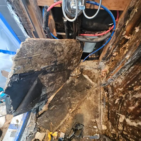 Rotted framing behind a shower, South Bay