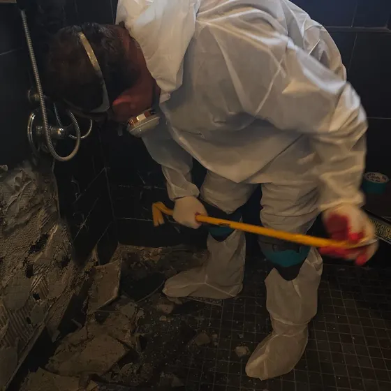 Tearing out a moldy shower, South Bay
