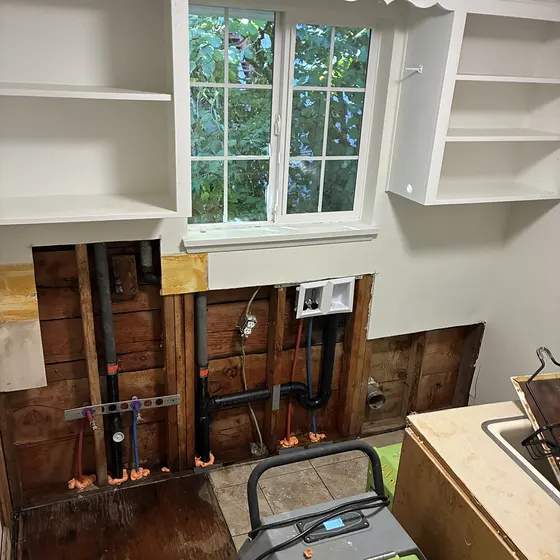 Dehumidifier drying opened walls, Greater Seattle