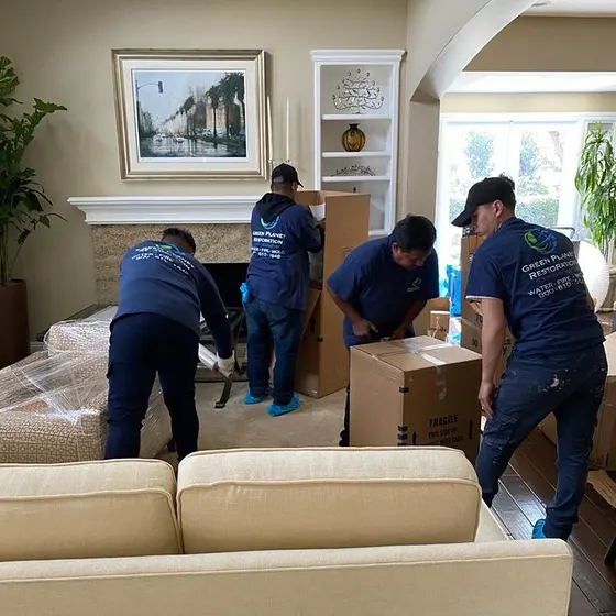 Crew packing furniture and contents, South Bay