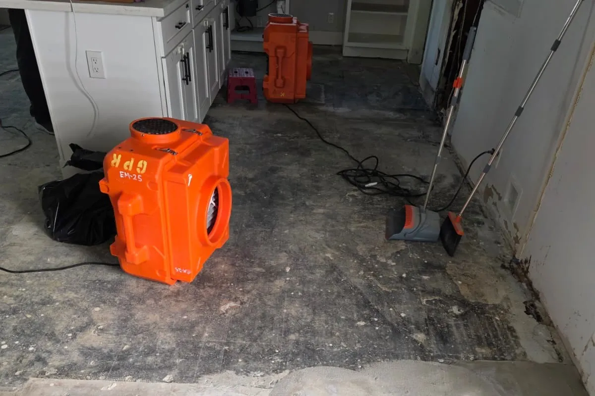HEPA air scrubber running on a stripped floor