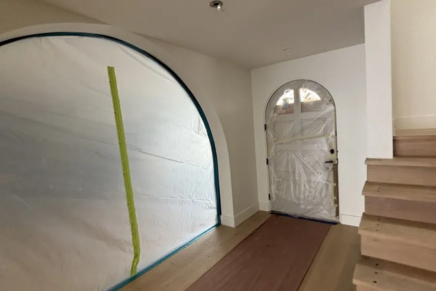 Hallway drywall and flooring after a leak