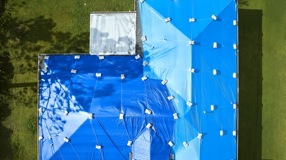 Protective Tarp Sheets Against Rain Water Leaks - Green Planet Restoration