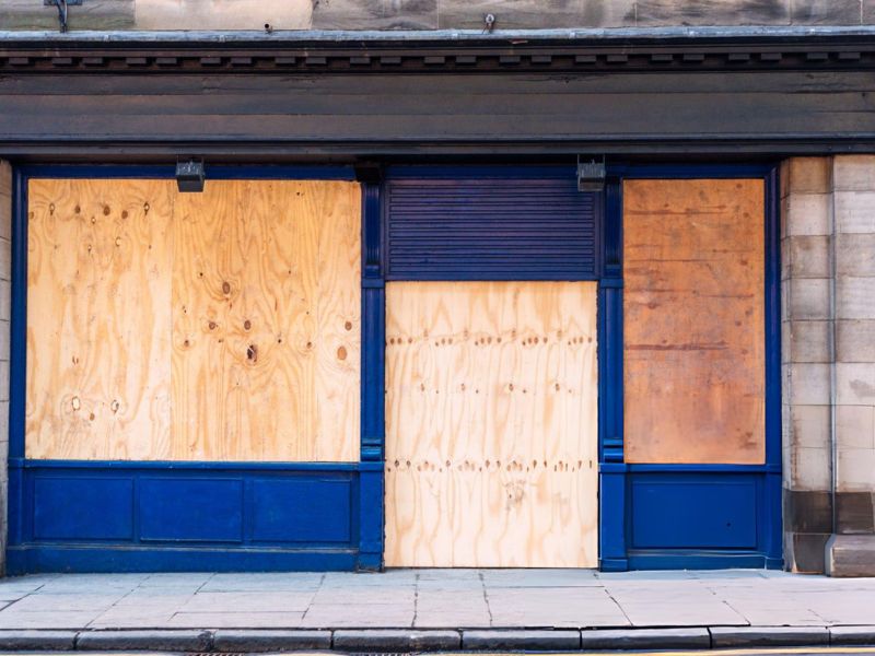 Closed and Boarded Up with Wooden Boards - Green Planet Restoration