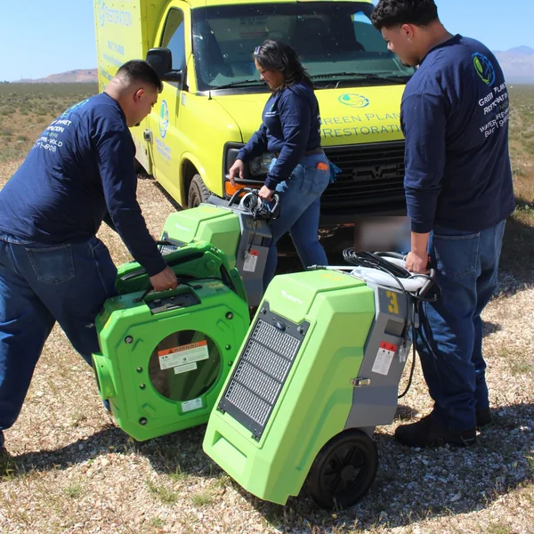 Crew unloading dehumidifiers, Antelope Valley