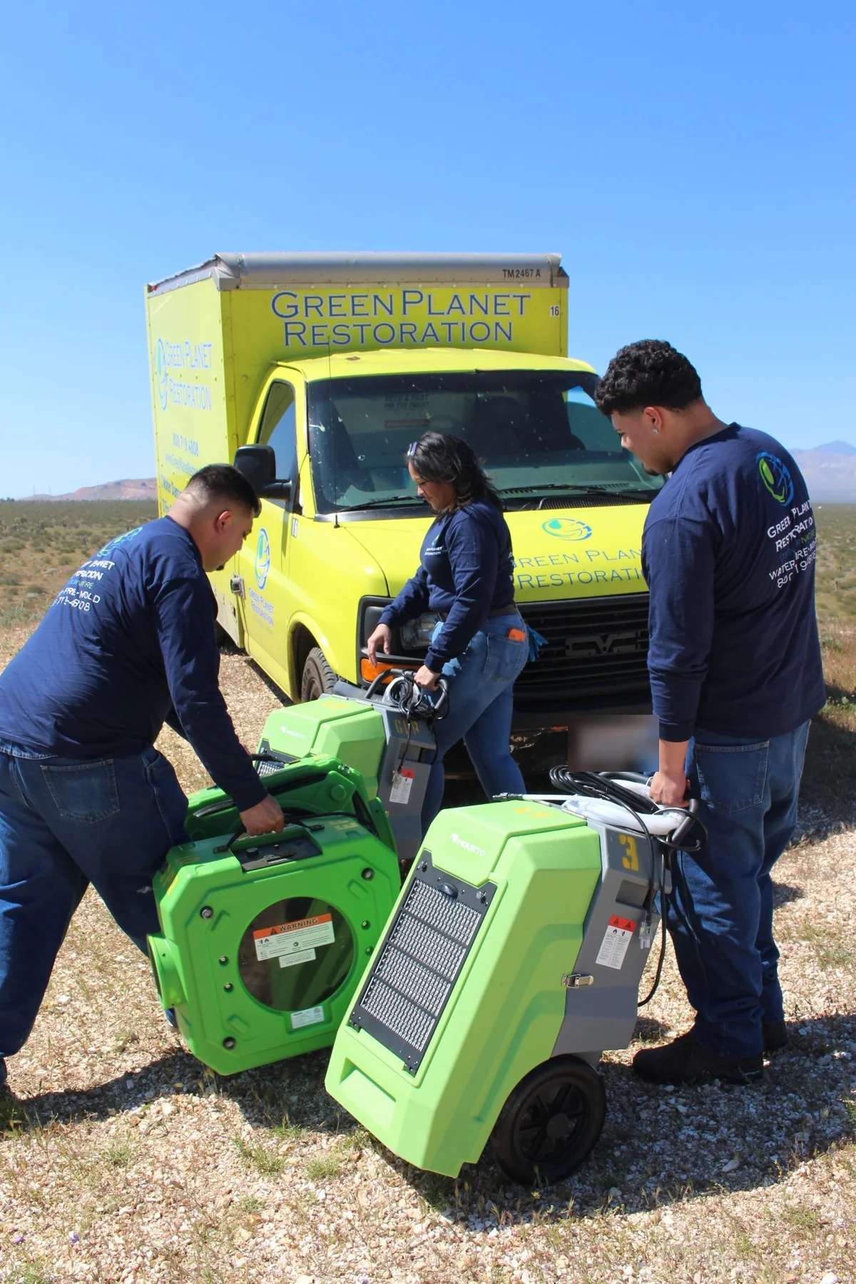 Antelope Valley crew unloading dehumidifiers