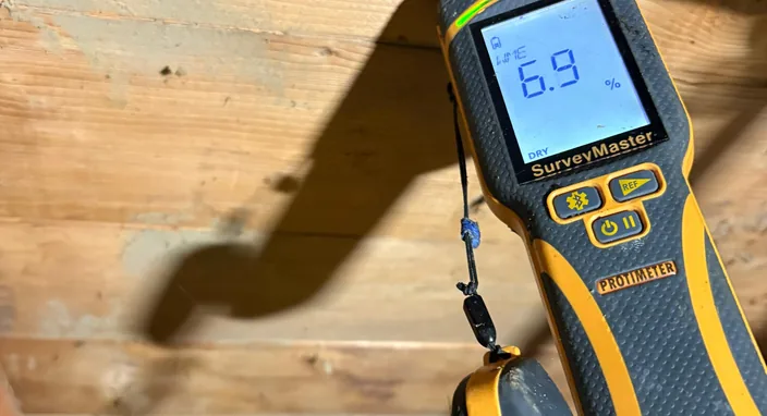 Moisture meter taking a reading