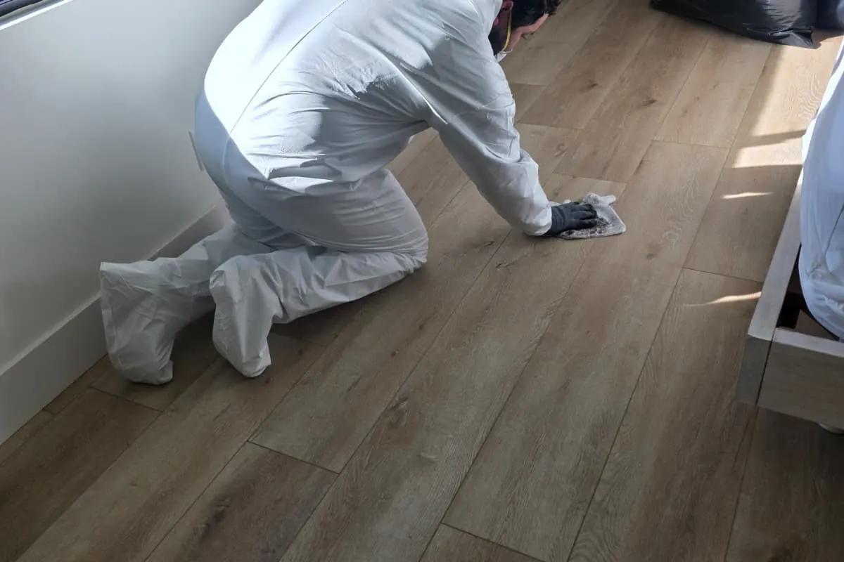 Wiping down floors during smoke cleanup