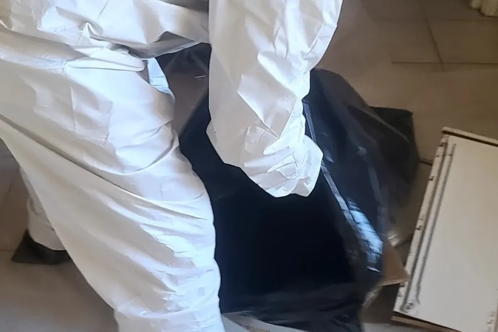 Bagging contaminated materials for disposal