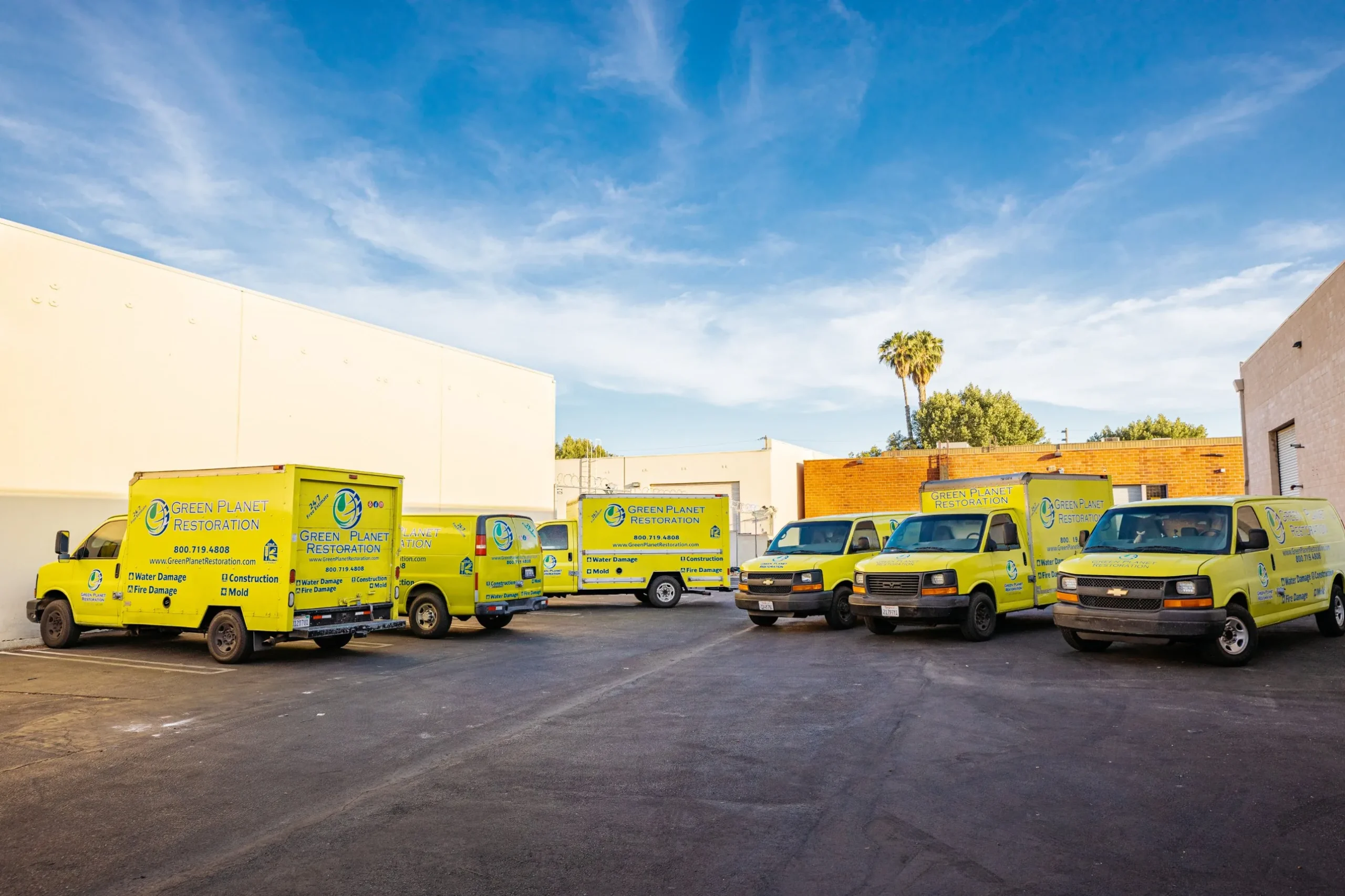 Green Planet Restoration crew and response trucks