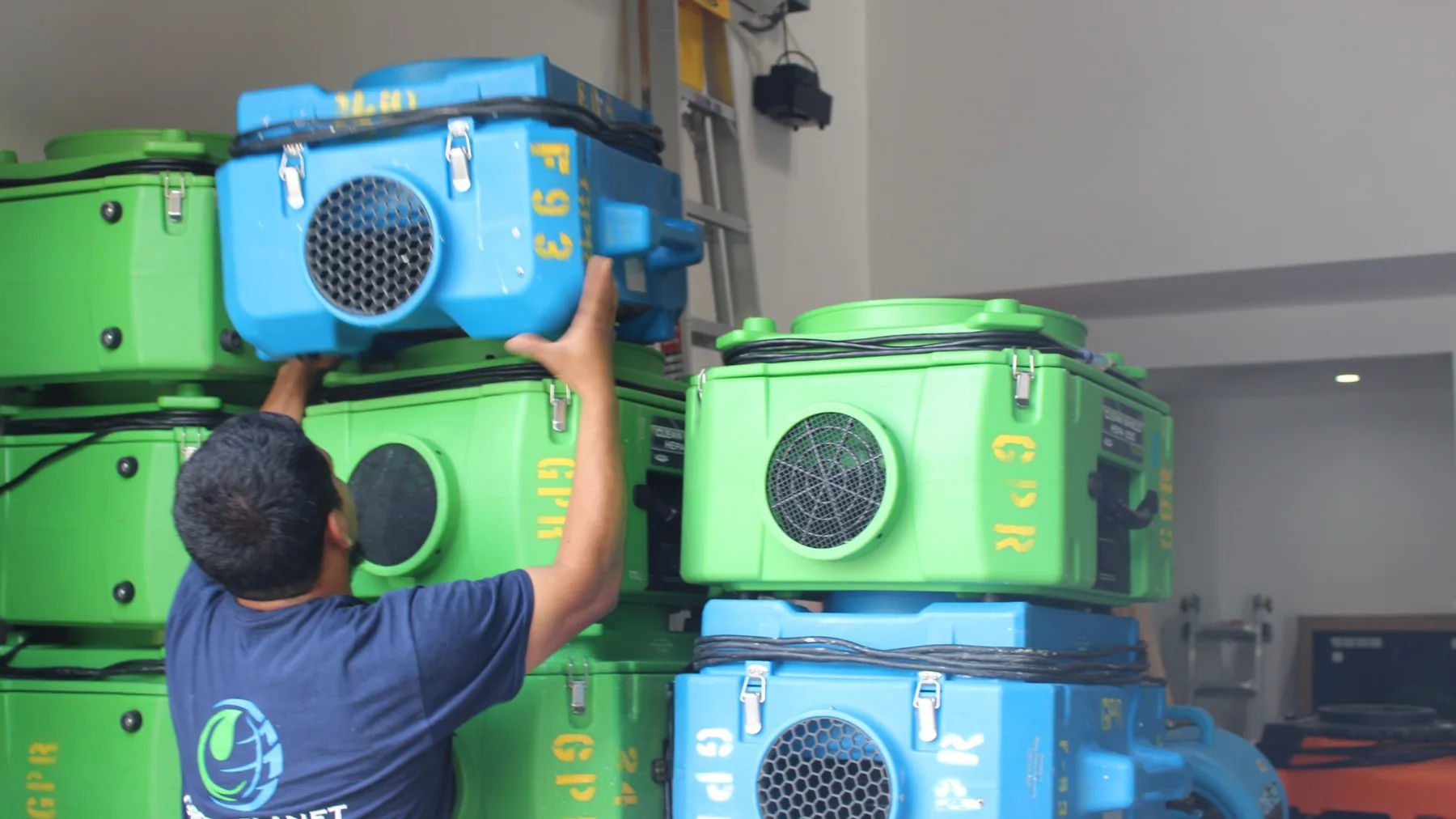 Technicians organizing contents in secure storage