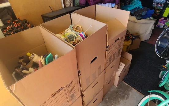 Technician packing household contents